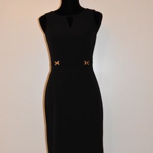 Tahari sheath dress. Black with gold accessories.